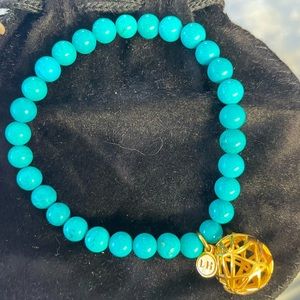 Lisa Hoffman wearable fragrance bracelet w/ fragrance beads & care instructions.